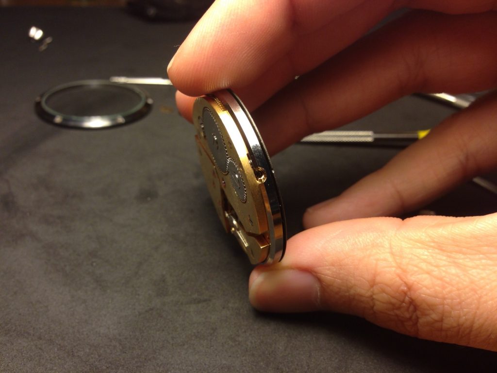 placing of movement ring into the watch's case