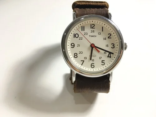 TIMEX INDEGLO WEEKENDER WATCH with nato leather watch strap on white background