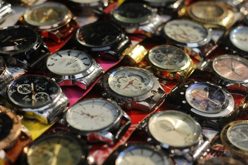 Variety of watches displayed for sale