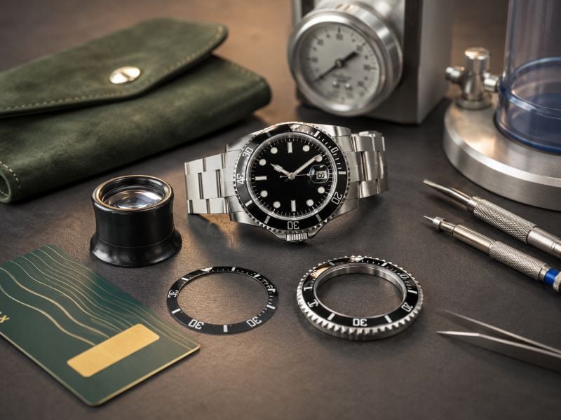 Luxury watch with tools and accessories