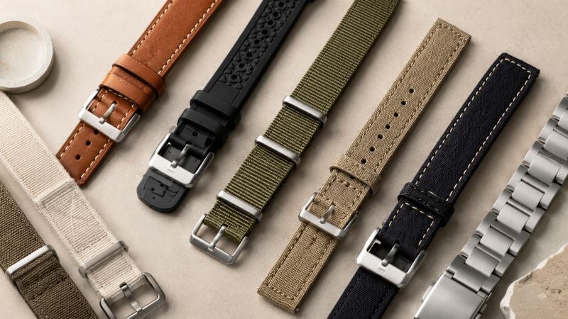 Variety of watch bands displayed neatly.